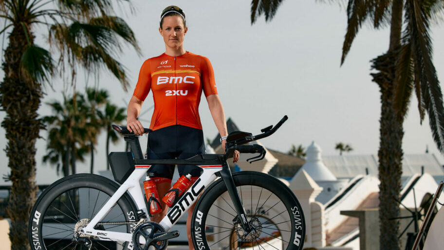 Kat Matthews with bike - BMC Pro Triathlon Team 2022