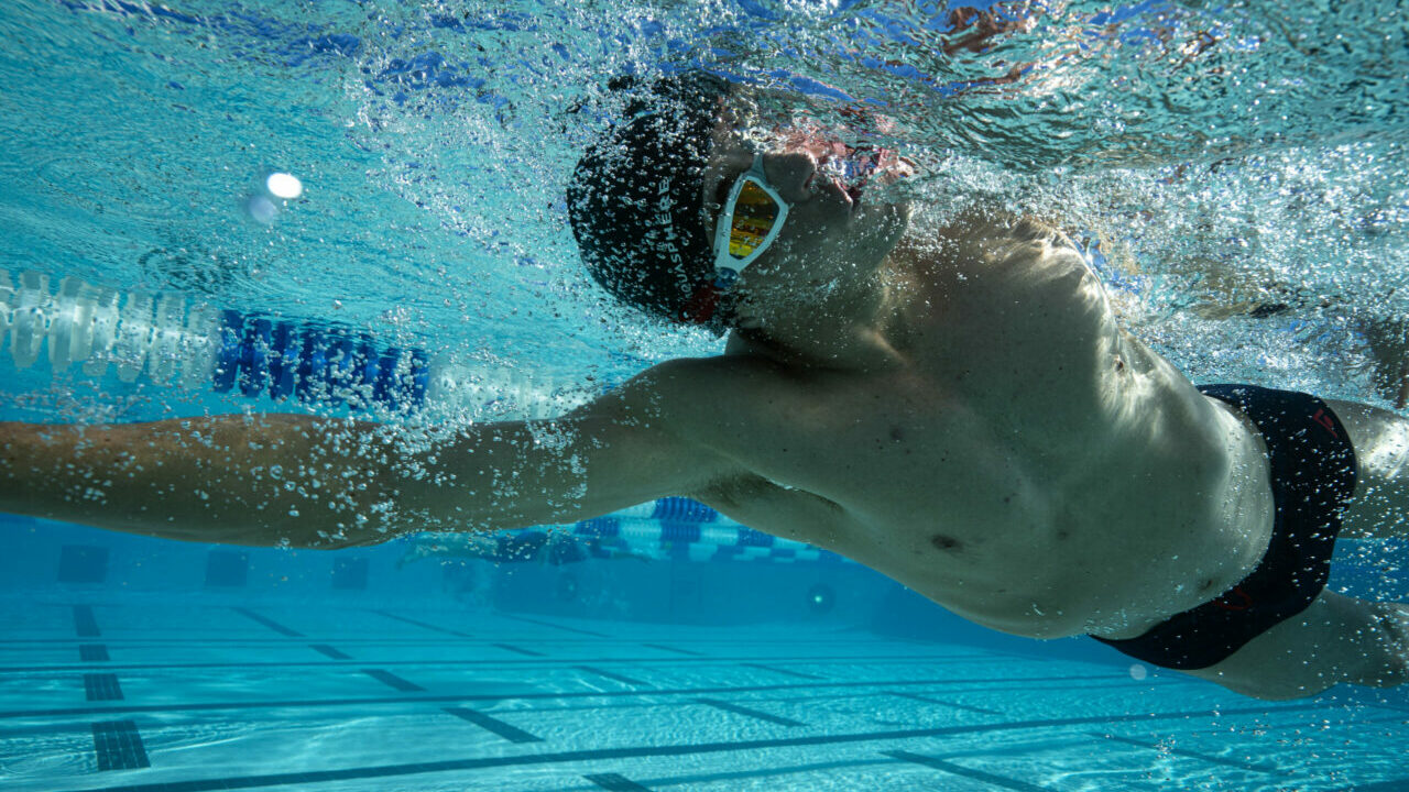 Sam Long swimming underwater