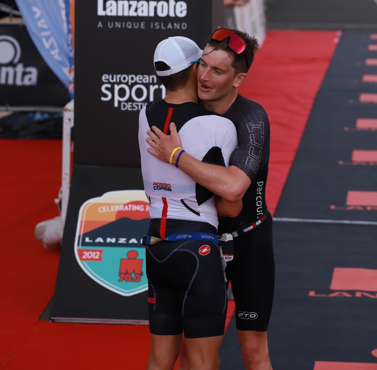 Leo Bergere and Kyle Smith IRONMAN 70.3 Lanzarote 2022 finish line