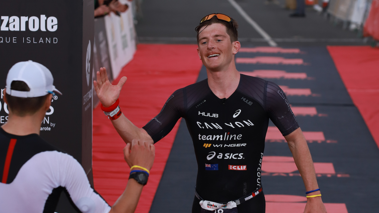 Kyle Smith / Leo Bergere finish line at IRONMAN 70.3 Lanzarote 2022