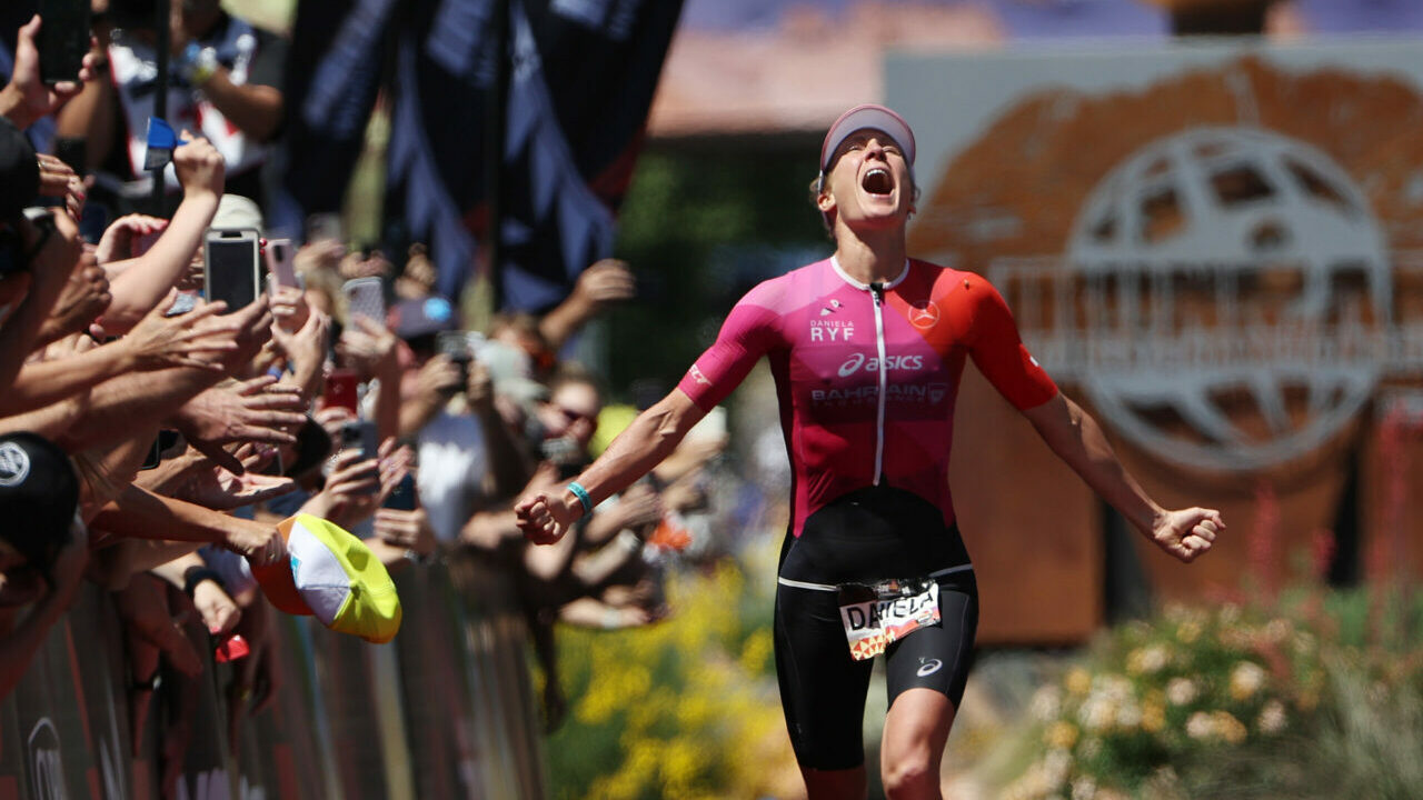 ST GEORGE, UTAH - MAY 07: Daniela Ryf of Switzerland celebrates as she nears the finish line to win the 2021 IRONMAN World Championships on May 07, 2022 in St George, Utah. (Photo by Tom Pennington/Getty Images for IRONMAN)