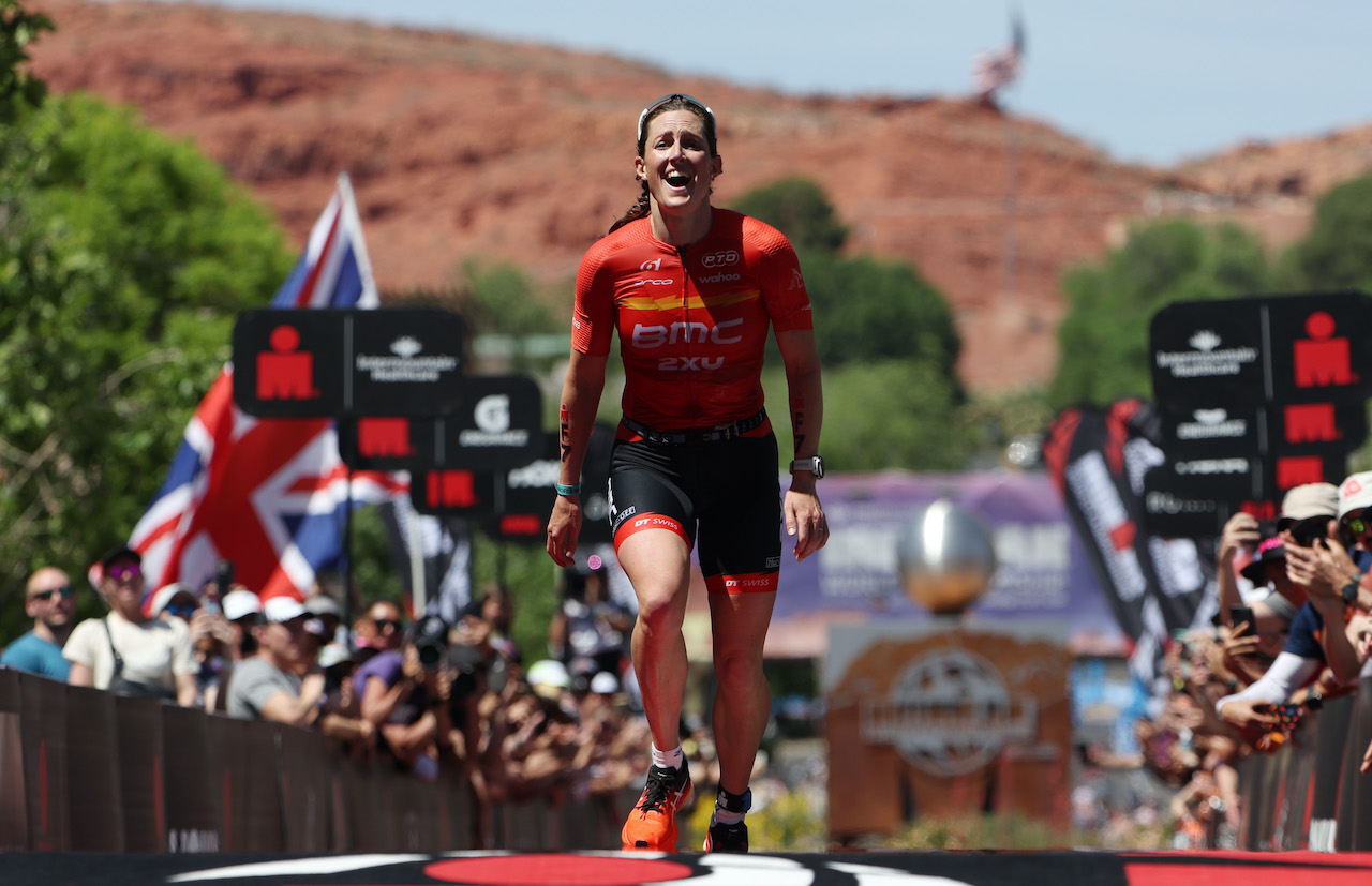 ST GEORGE, UTAH - MAY 07: Kat Matthews of Great Britain celebrates after crossing the finish line to place second in the 2021 IRONMAN World Championships on May 07, 2022 in St George, Utah. (Photo by Tom Pennington/Getty Images for IRONMAN)