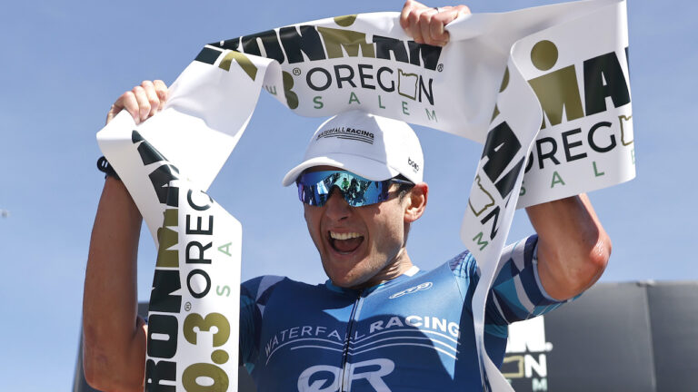 SALEM, OREGON - JULY 10: Justin Metzler celebrates as he finishes in first place IRONMAN 70.3 Oregon on July 10, 2022 in Salem, Oregon. (Photo by Michael Owens/Getty Images for IRONMAN)