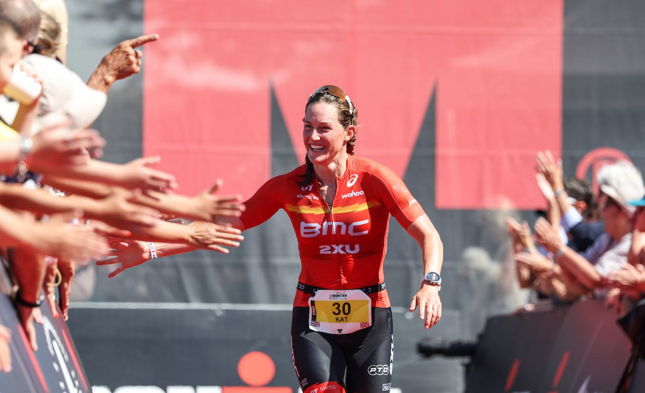 CARDIFF, WALES - AUGUST 07: Kat Matthews of Britain celebrates winning the women’s race at IRONMAN 70.3 Swansea on August 7, 2022 in Cardiff, United Kingdom. (Photo by Nigel Roddis/Getty Images for IRONMAN)