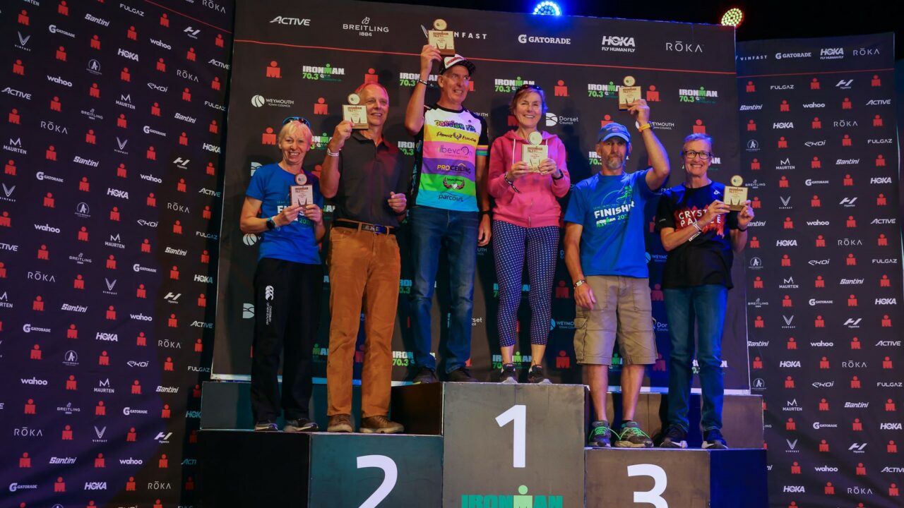 IRONMAN 70.3 Weymouth 2022 podiums. Photo credit Huw Fairclough