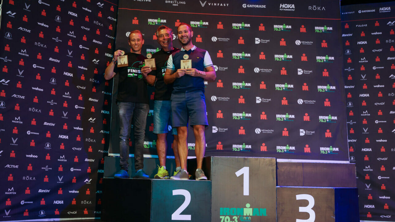 IRONMAN 70.3 Weymouth 2022 podiums. Photo credit Huw Fairclough