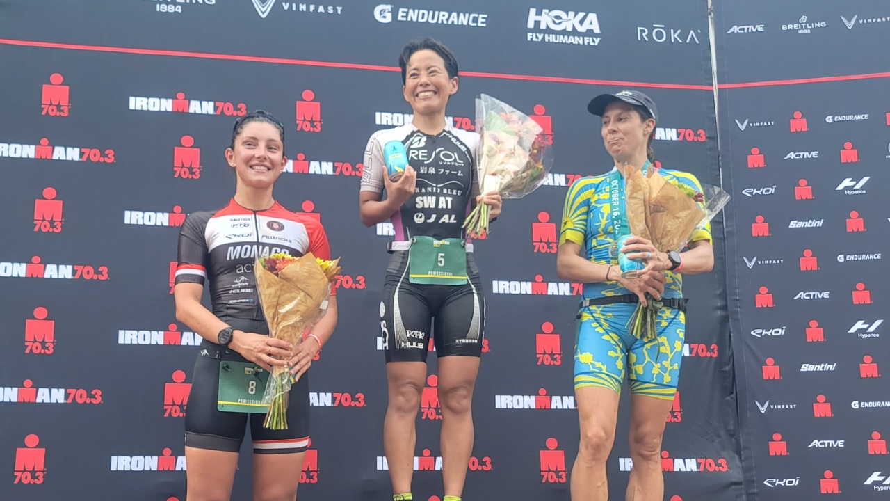 Ai Ueda womens podium 703 Waco 2022 photo credit Josh Miller Getty Images for IRONMAN