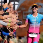 ST GEORGE, UTAH - OCTOBER 28: Emma Pallant-Browne of Britain celebrates as she finishes in third place during the IRONMAN 70.3 World Championship on October 28, 2022 in St George, Utah. (Photo by Patrick McDermott/Getty Images for IRONMAN)