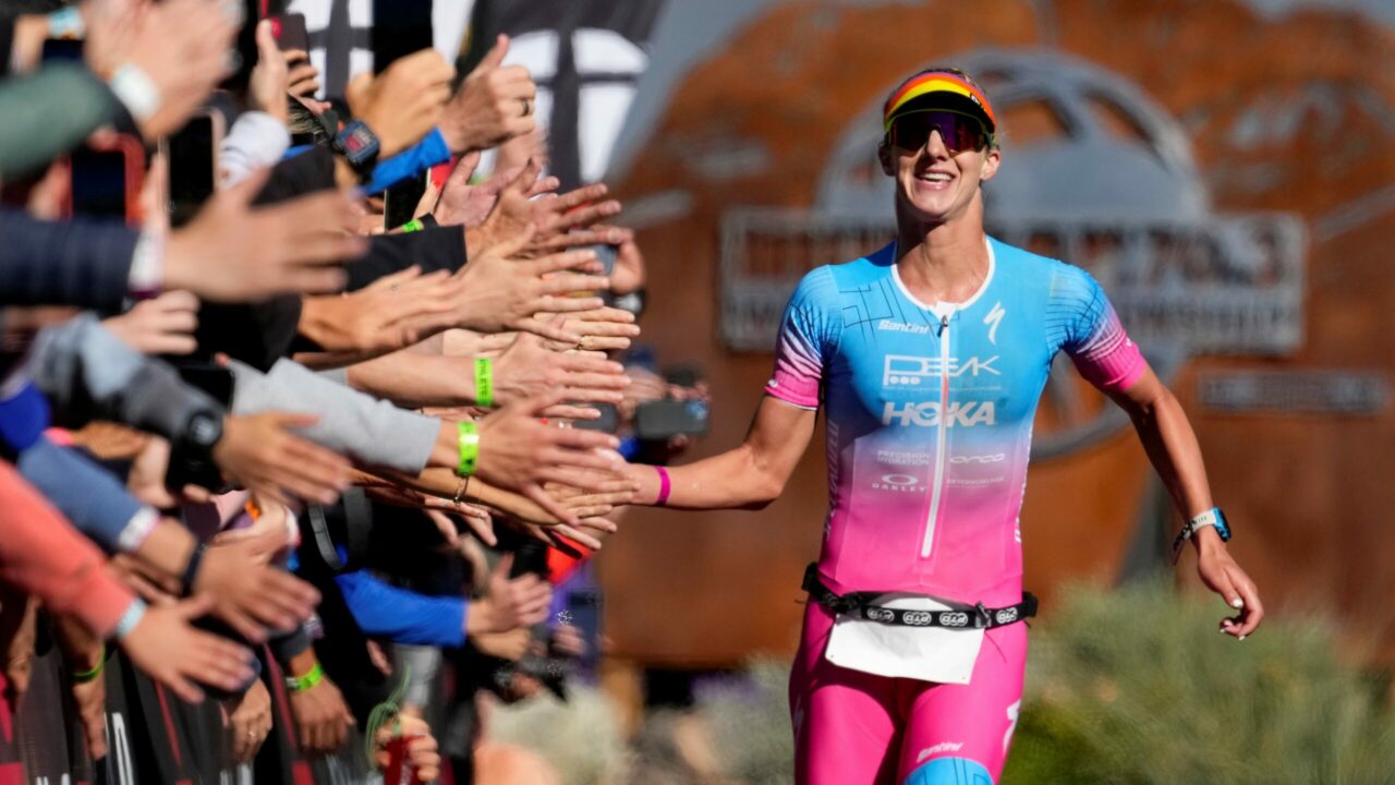 ST GEORGE, UTAH - OCTOBER 28: Emma Pallant-Browne of Britain celebrates as she finishes in third place during the IRONMAN 70.3 World Championship on October 28, 2022 in St George, Utah. (Photo by Patrick McDermott/Getty Images for IRONMAN)