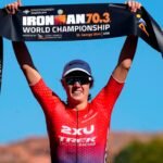 ST GEORGE, UTAH - OCTOBER 28: Taylor Knibb of the United States celebrates after finishing in first place during the IRONMAN 70.3 World Championship on October 28, 2022 in St George, Utah. (Photo by Patrick McDermott/Getty Images for IRONMAN)