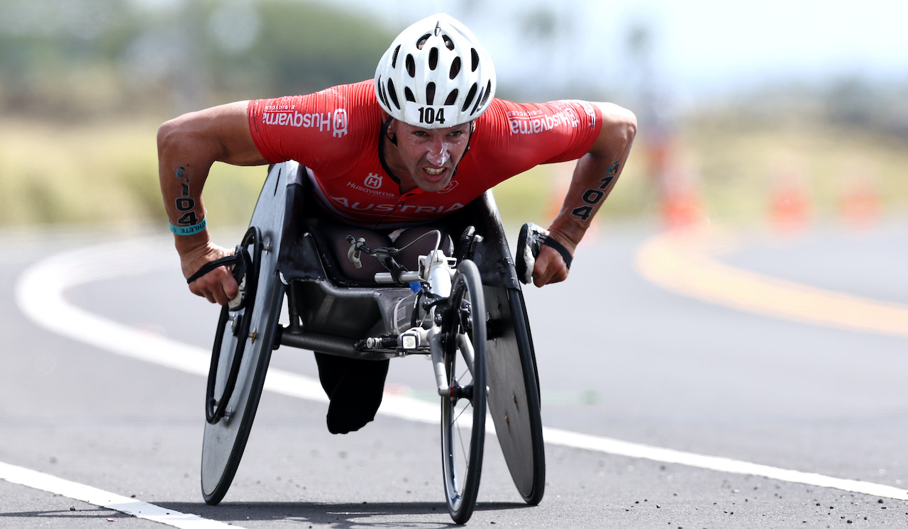 KAILUA KONA, HAWAII - OCTOBER 06: Thomas Fruhwirth of Austria competes during the run portion of the Ironman World Championships on October 06, 2022 in Kailua Kona, Hawaii. (Photo by Tom Pennington/Getty Images for IRONMAN)