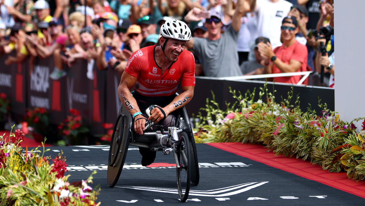 KAILUA KONA, HAWAII - OCTOBER 06: Thomas Fruhwirth of Austria celebrates winning his category during the Ironman World Championships on October 06, 2022 in Kailua Kona, Hawaii. (Photo by Katelyn Mulcahy/Getty Images for IRONMAN)