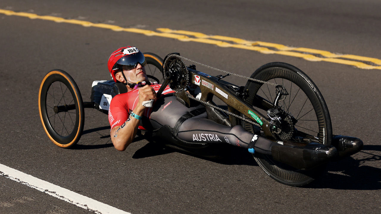 KAILUA KONA, HAWAII - OCTOBER 06: Thomas Fruhwirth of Austria competes on the bike during the Ironman World Championships on October 06, 2022 in Kailua Kona, Hawaii. (Photo by Ezra Shaw/Getty Images for IRONMAN)