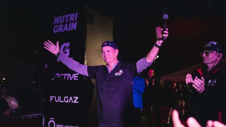 Legendary IRONMAN announcer Mike Reilly hangs up his microphone at IRONMAN New Zealand photo credit Cameron Mackenzie