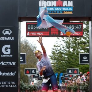 Sarah Crowley winning GWM IRONMAN Western Australia - Photo Korupt Vision