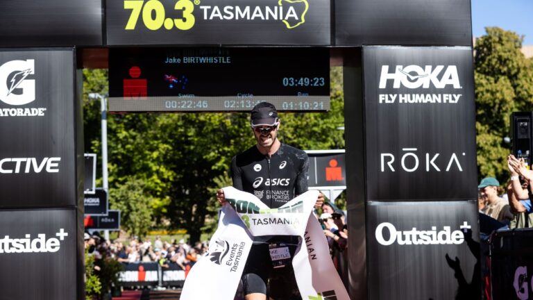 Jake Birtwhistle takes the win at IRONMAN 70.3 Tasmania photo credit Korupt Vision