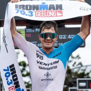Mike Phillips winning the 2023 IRONMAN 70.3 Geelong [Photo credit: Korupt Vision]