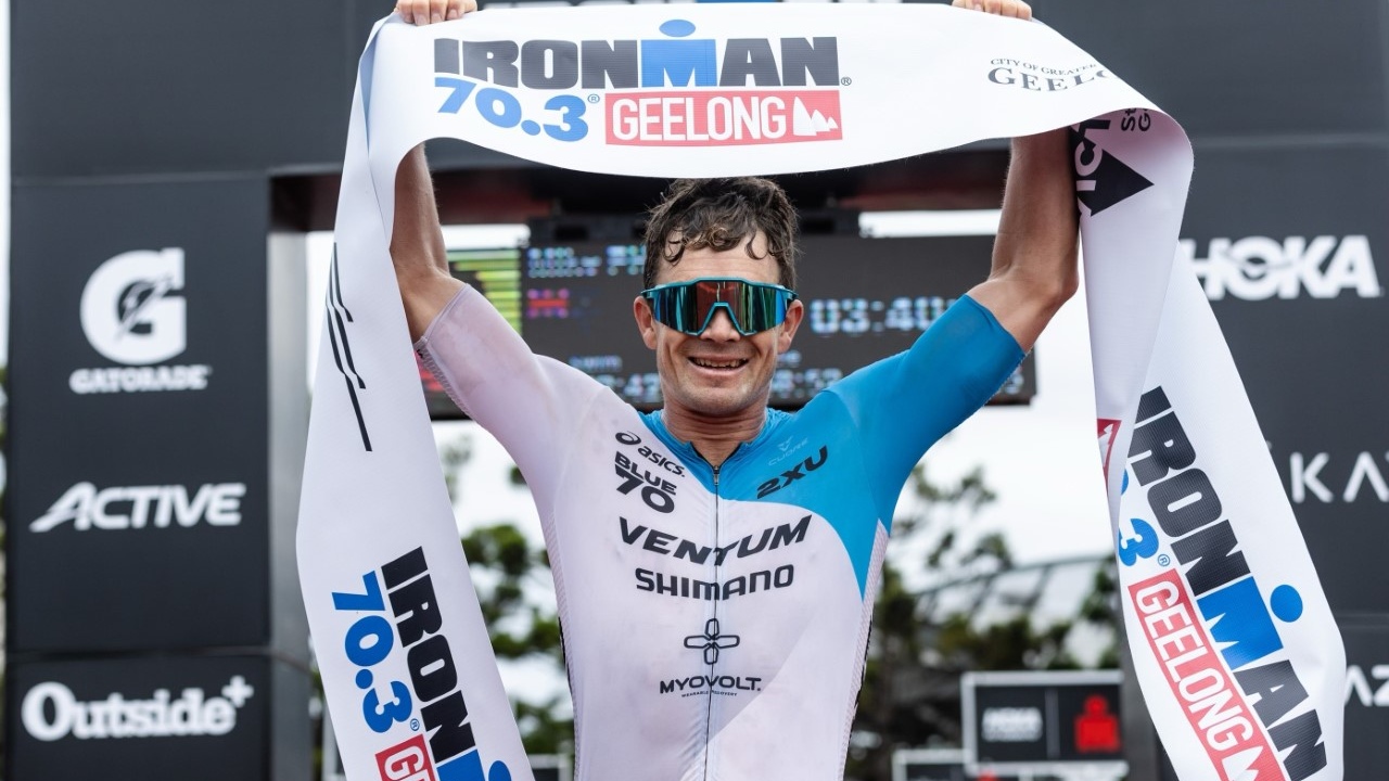 Mike Phillips winning the 2023 IRONMAN 70.3 Geelong [Photo credit: Korupt Vision]