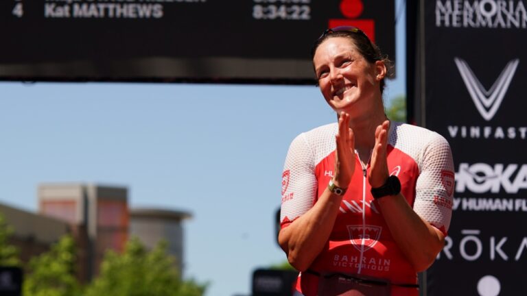 Kat Matthews takes the plaudits at IRONMAN Texas 2023 [Photo credit: Kyle Rivas / Getty Images for IRONMAN]