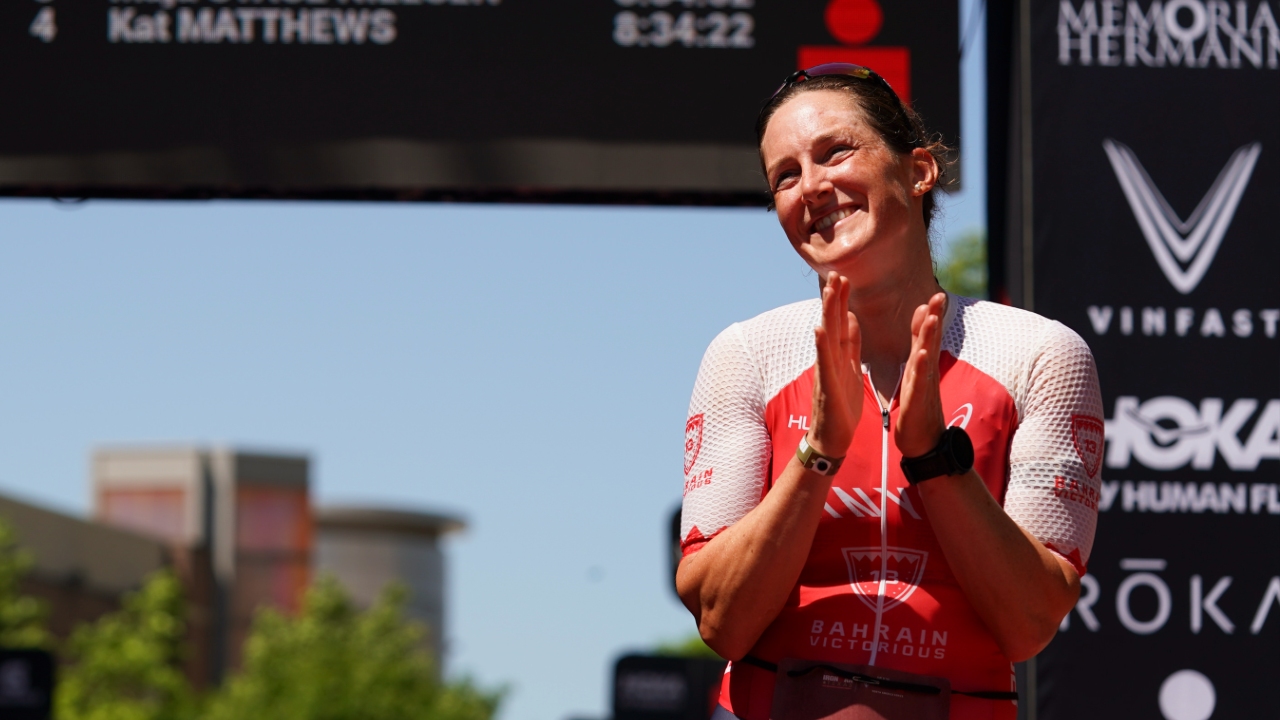 Kat Matthews takes the plaudits at IRONMAN Texas 2023 [Photo credit: Kyle Rivas / Getty Images for IRONMAN]