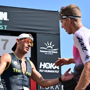 Sam Long Lionel Sanders IRONMAN 703 Gulf Coast 2023 finish line [Photo credit: Julio Aguilar / Getty Images for IRONMAN]