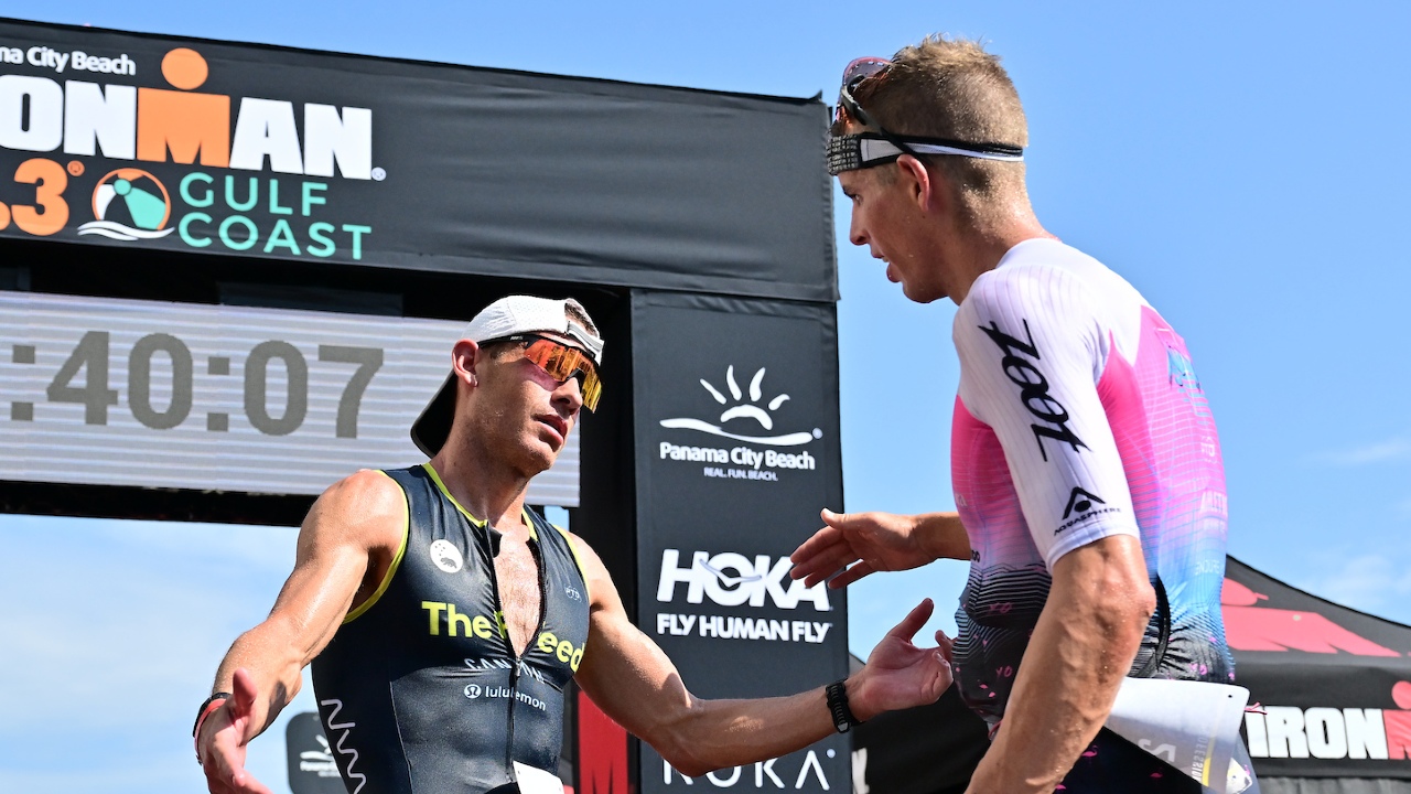 Sam Long Lionel Sanders IRONMAN 703 Gulf Coast 2023 finish line [Photo credit: Julio Aguilar / Getty Images for IRONMAN]