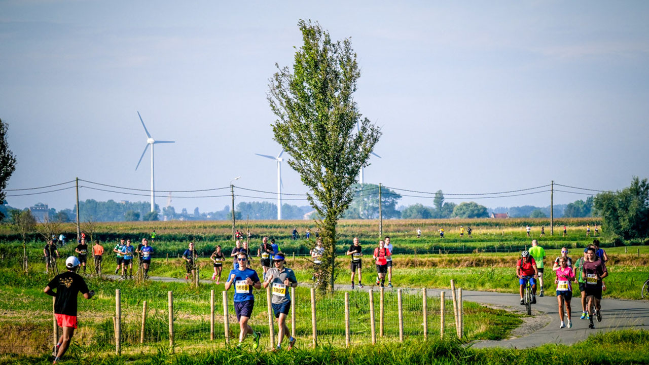 Long Course Weekend Belgium - runners in open countryside Long Course Weekend Belgium - runners in open countryside