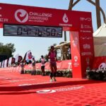 Emma Pallant-Browne crosses the line at Challenge Samarkand photo credit Challenge Family