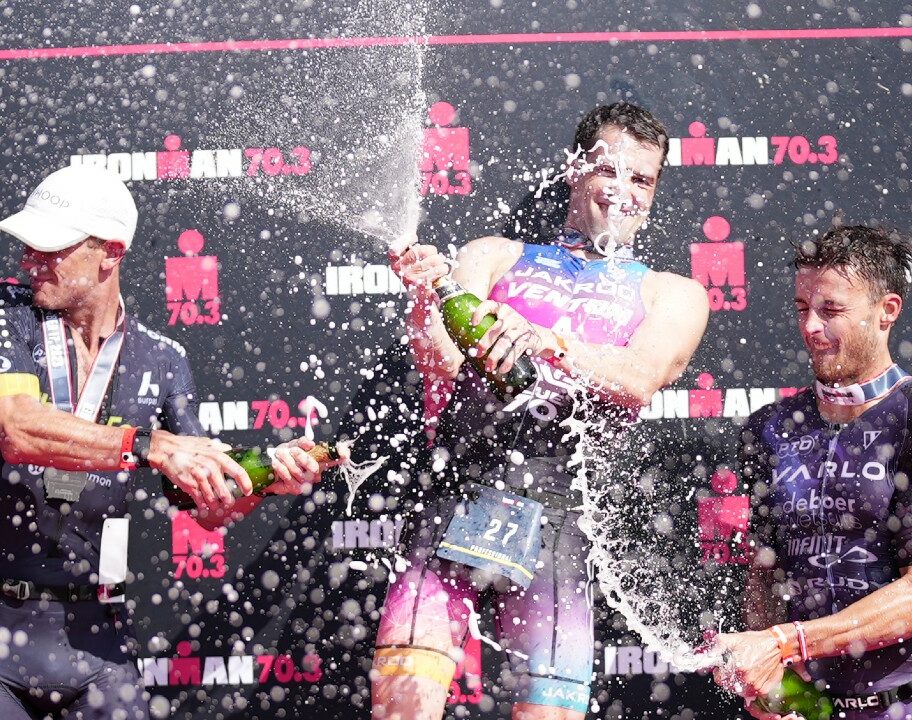 Lionel Sanders Jackson Laundry Trevor Foley podium celebrations Michigan photo credit IRONMAN