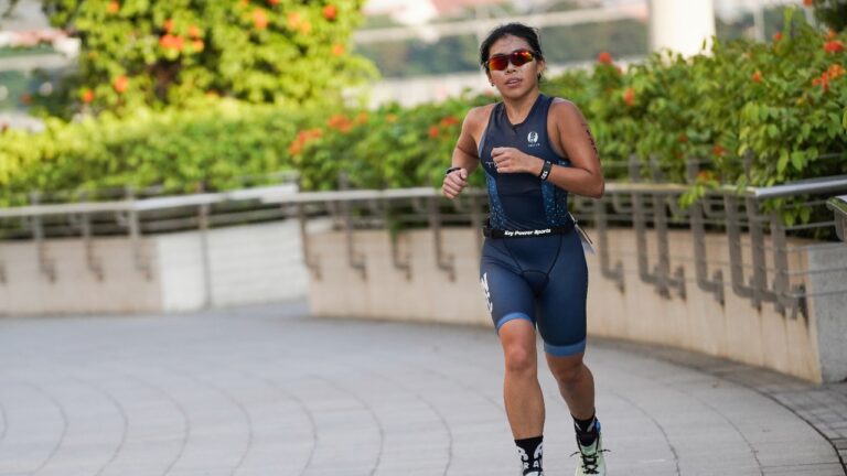 Age group triathlete on the run course at PTO Age Group Asian Open