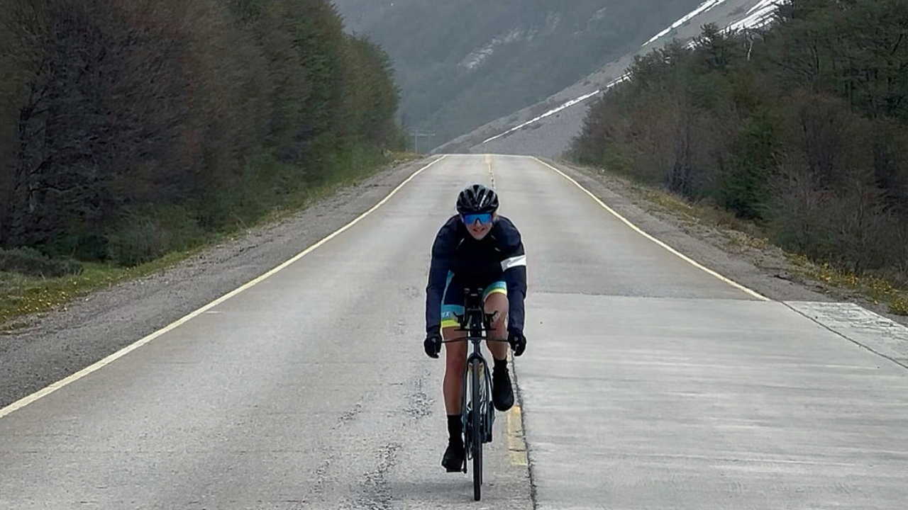 Pro IRONMAN triathlete Laura Siddall riding a TT bike in Patagonia, training for Patagonman Xtreme Triathlon