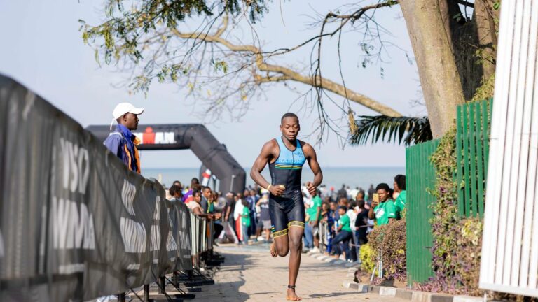 Spectators line the swim exit at IRONMAN 70.3 Rwanda