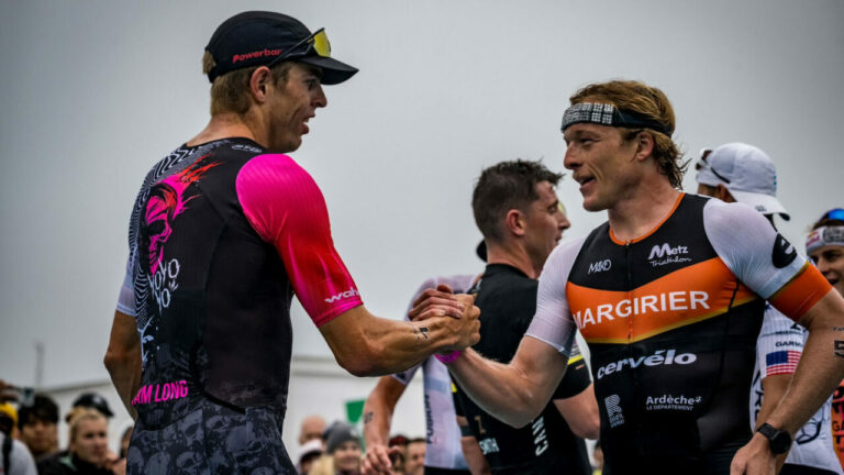 Sam Long and Mathis Margirier shake hands after a battle on the run.