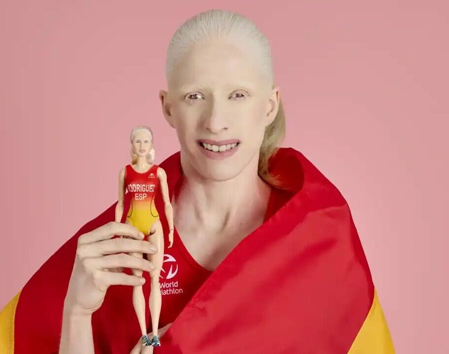 Spanish triathlete Susana Rodriguez with her Barbie doll.