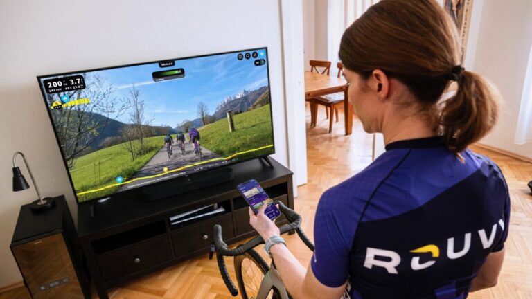 Woman using ROUVY app