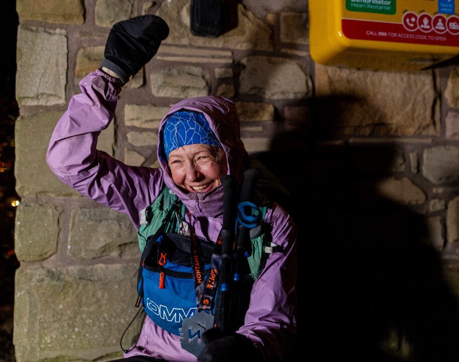 Lucy Gossage finish line wall Montane Winter Spine Race 2025 [Photo credit: Wild Aperture Photography / The Spine Race]