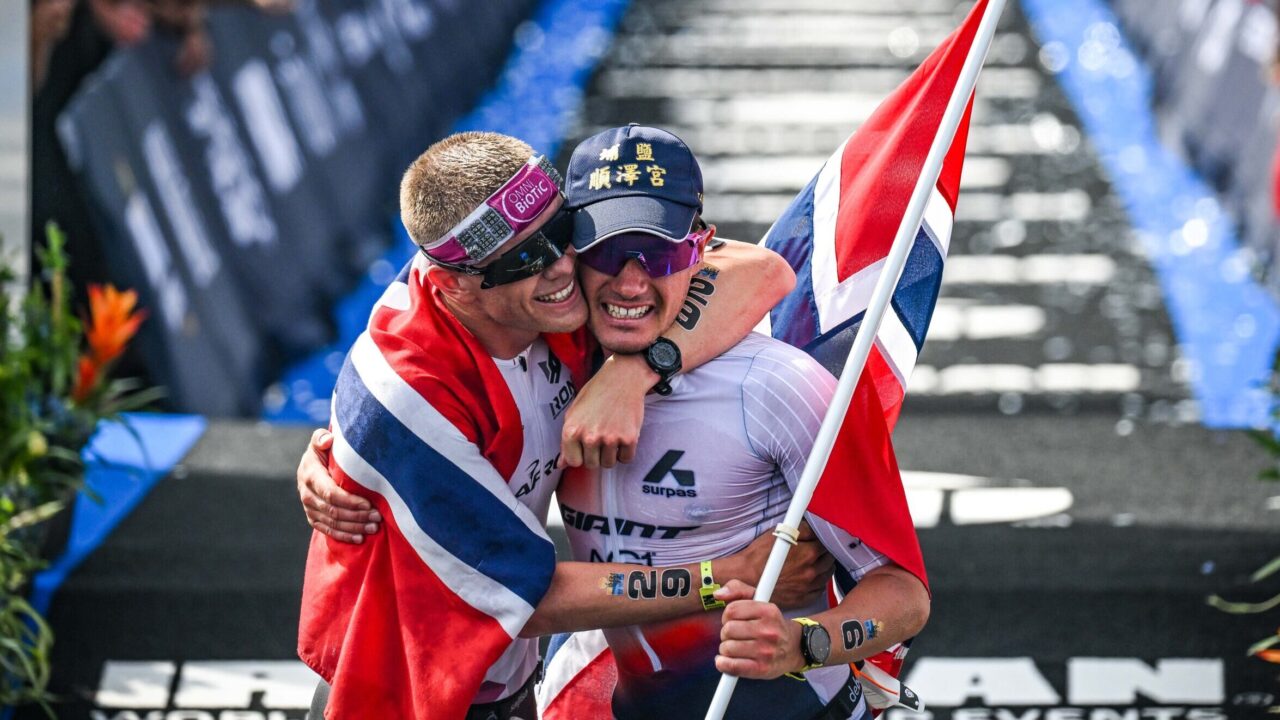 Casper Stornes and Gustav Iden celebrate at the finishing line of the IRONMAN World Championships in Nice, 2025.