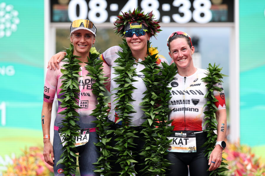 Solveig Løvseth, middle, is joined on the Kona podium by Laura Philipp, left, and Kat Matthews. (Photo credit: IRONMAN)