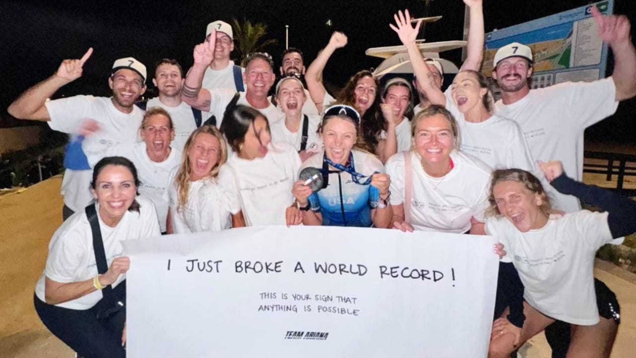 Ariana Luterman record celebration with friends IRONMAN Barcelona