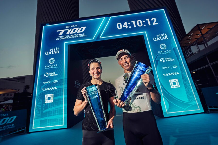 Kate Waugh and Hayden Wilde show off their trophies after winning the T100 World Triathlon Tour finals.