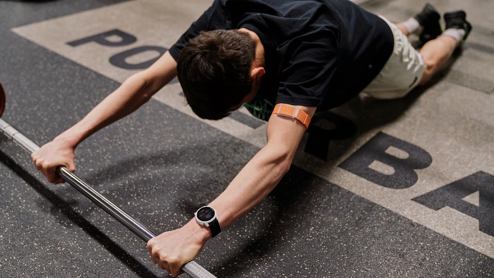 Alex Yee training in the gym, performing strength exercises to improve endurance, power, and overall triathlon performance.