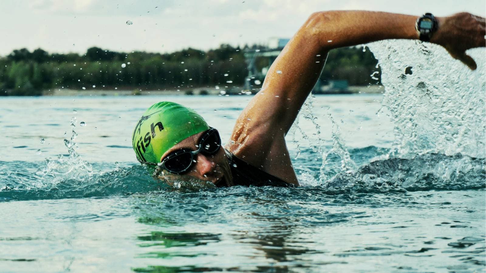 open water swimmer training in cold conditions to build endurance and mental resilience