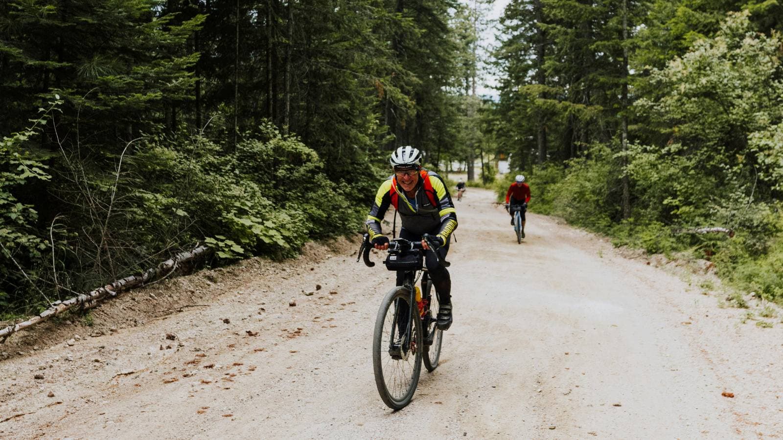 beginner triathlete training for gravel triathlon with swimming cycling and trail running sessions