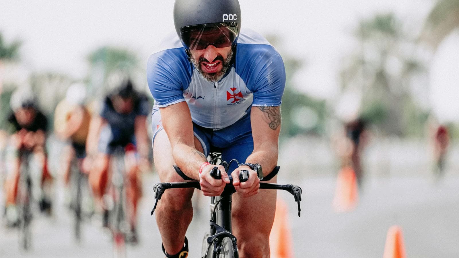 cyclist maintaining steady cadence on road bike during long distance ride to improve endurance and efficiency