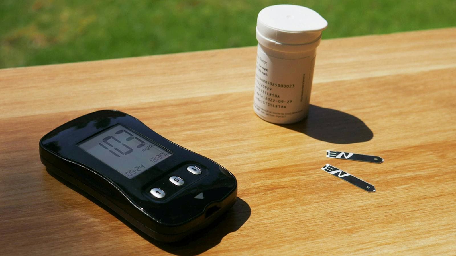 Athlete undergoing lactate threshold testing with blood sample to measure lactate levels during exercise