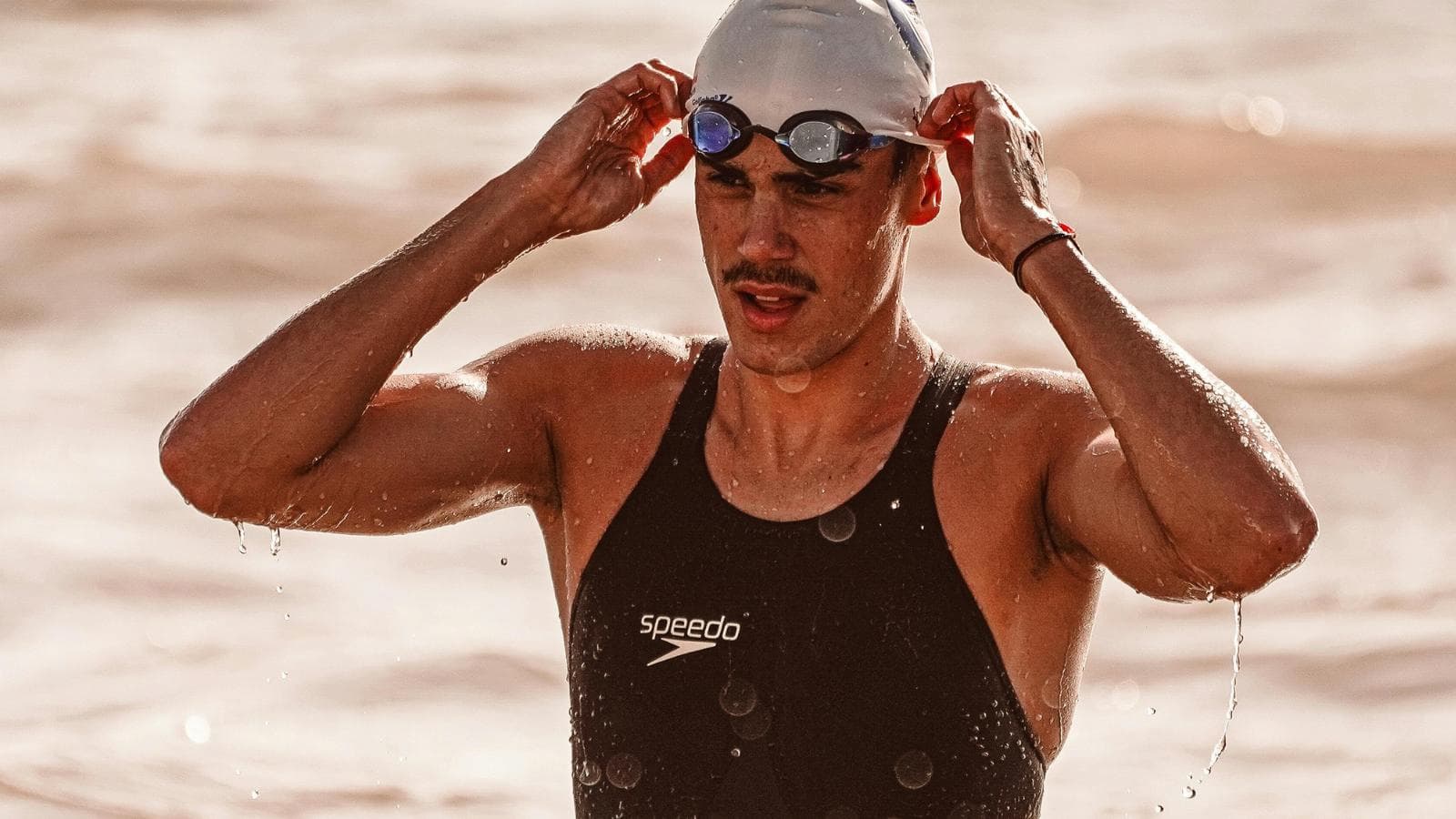 swimmer adjusting breathing pattern in rough open water conditions to improve comfort and control