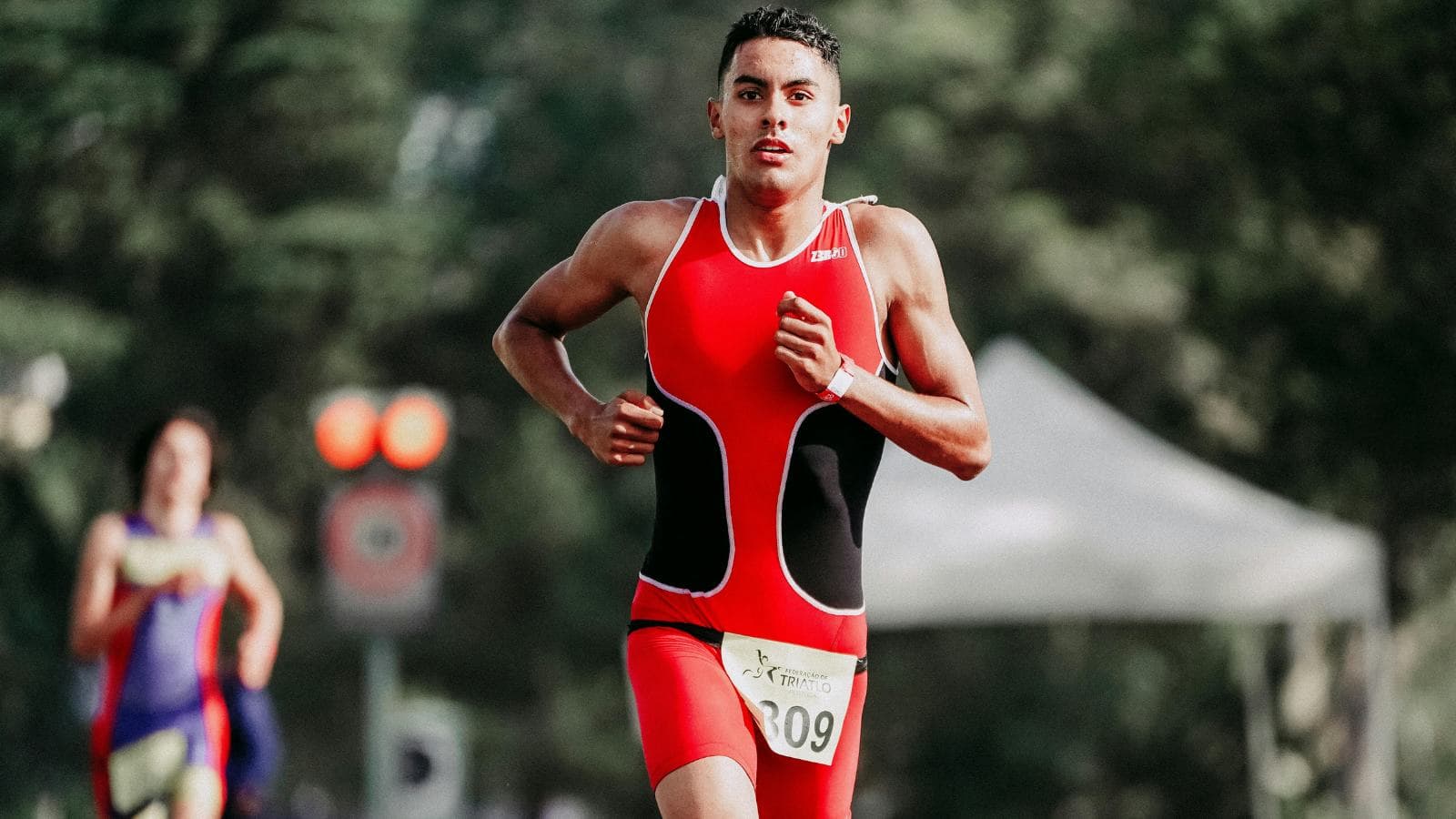 triathlete training efficiently across swim bike and run disciplines to improve endurance and performance