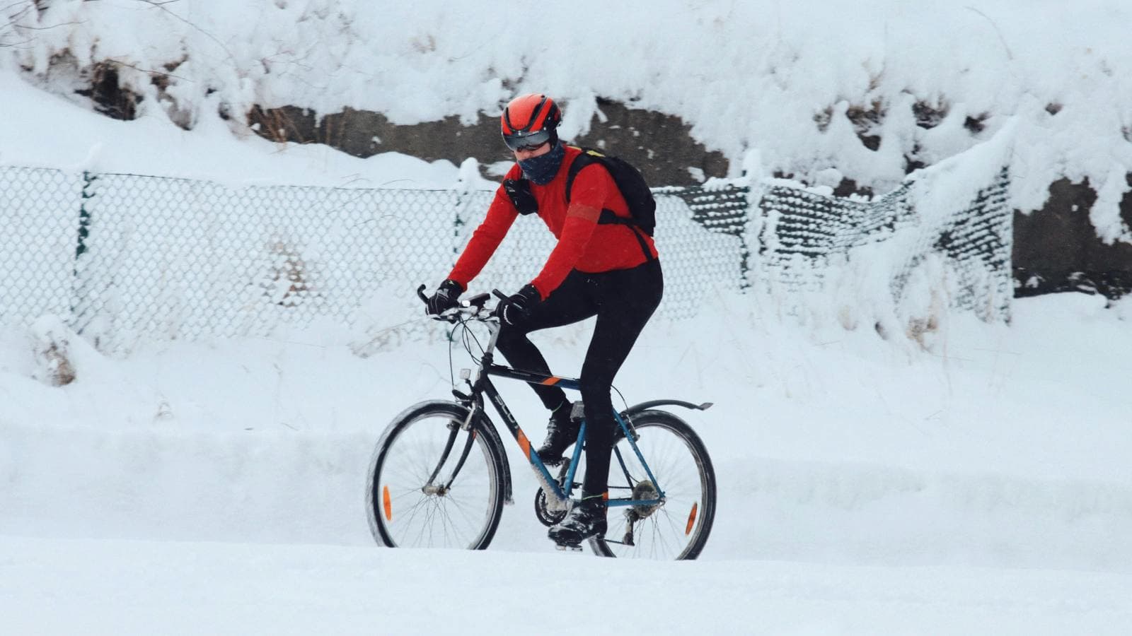 triathlete training outdoors in winter conditions preparing for winter triathlon race