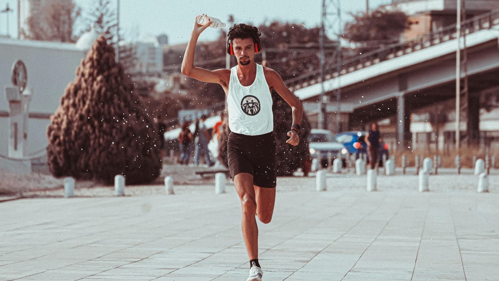 endurance athlete sweating during heat training session to improve stamina and aerobic performance
