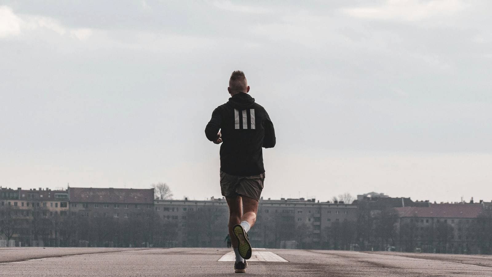 athlete practicing running form drills to improve efficiency and endurance in triathlon
